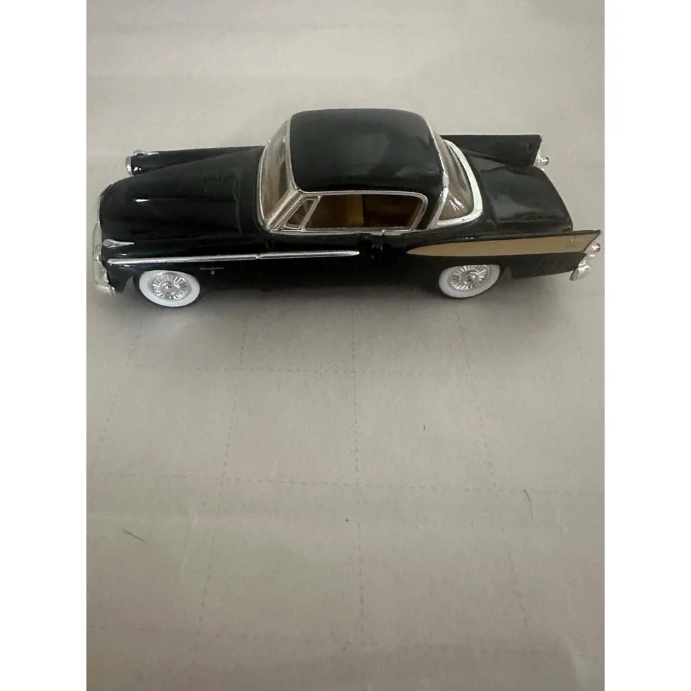 Toy Metal Die Cast 1958 Studebaker Golden Hawk Road Signature Car Black Gold